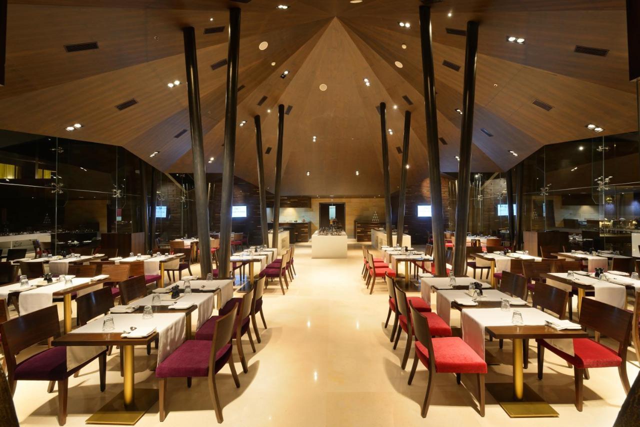 Marasa Sarovar Premiere Tirupati Exterior photo The interior of the restaurant