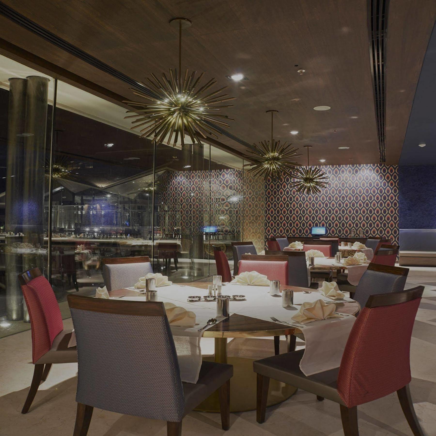 Marasa Sarovar Premiere Tirupati Exterior photo The interior of the restaurant